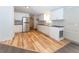 Modern kitchen with white cabinets and stainless steel refrigerator at 12816 Midvale Ave, New Port Richey, FL 34654