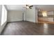 Open concept living room and kitchen with vinyl flooring at 12816 Midvale Ave, New Port Richey, FL 34654