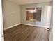 Simple bedroom with wood-look flooring and neutral walls at 1299 Birchcrest Blvd, Port Charlotte, FL 33952