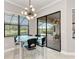 Breakfast nook with glass table and view of the pool and golf course at 13819 Swiftwater Way, Bradenton, FL 34211