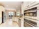 Modern kitchen featuring stainless steel appliances and granite countertops at 13819 Swiftwater Way, Bradenton, FL 34211