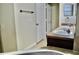 Double vanity bathroom with a large mirror and access to other rooms at 14003 Citrus Crest Cir, Tampa, FL 33625