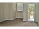 Bright bedroom with private balcony access and neutral decor at 14003 Citrus Crest Cir, Tampa, FL 33625