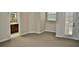 Carpeted bedroom with ensuite bathroom and private access to outdoor space at 14003 Citrus Crest Cir, Tampa, FL 33625