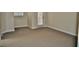 Spacious carpeted bedroom with access to balcony at 14003 Citrus Crest Cir, Tampa, FL 33625