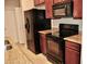 Black appliances and granite countertops in kitchen at 14003 Citrus Crest Cir, Tampa, FL 33625