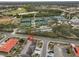 Aerial view showing house location in community with amenities at 1601 Woodmar Dr, Sun City Center, FL 33573
