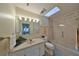 Clean bathroom with shower/tub combo and vanity at 1601 Woodmar Dr, Sun City Center, FL 33573