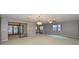 Bright dining room with sliding glass doors and neutral colors at 1601 Woodmar Dr, Sun City Center, FL 33573