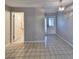 Spacious entryway with tile flooring and access to bathroom at 1601 Woodmar Dr, Sun City Center, FL 33573