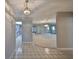 Inviting entryway with views into living and kitchen areas at 1601 Woodmar Dr, Sun City Center, FL 33573