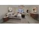 Main bedroom with stylish furnishings and ample space at 1601 Woodmar Dr, Sun City Center, FL 33573