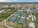 Aerial view of community tennis courts at 1601 Woodmar Dr, Sun City Center, FL 33573