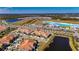 Property location shown with resort-style pool nearby at 16909 April Plush Dr, Wimauma, FL 33598