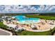 Aerial view of Southshore Bay's crystal lagoon, beach, and amenities at 16909 April Plush Dr, Wimauma, FL 33598