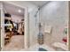 Bathroom with walk-in shower and adjacent closet at 16909 April Plush Dr, Wimauma, FL 33598