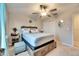 Bedroom with a queen-size bed and window at 16909 April Plush Dr, Wimauma, FL 33598