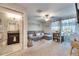 Multi-functional bonus room with sectional sofa and workspace at 16909 April Plush Dr, Wimauma, FL 33598