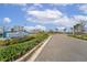 Southshore Bay entrance with lush landscaping and signage at 16909 April Plush Dr, Wimauma, FL 33598