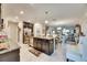 Spacious kitchen with an island and stainless steel appliances at 16909 April Plush Dr, Wimauma, FL 33598