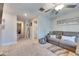Upstairs loft area with couch and bathroom access at 16909 April Plush Dr, Wimauma, FL 33598