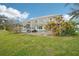 House with a fenced-in pool and backyard at 1919 Blue River Rd, Holiday, FL 34691