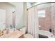 Clean bathroom with tub shower combo at 1919 Blue River Rd, Holiday, FL 34691