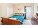 Bedroom with a full-size bed and large closet at 1919 Blue River Rd, Holiday, FL 34691