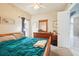 Bedroom with a queen-size bed and built-in wardrobe at 1919 Blue River Rd, Holiday, FL 34691