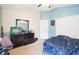 Bedroom with double door closet and dresser at 1919 Blue River Rd, Holiday, FL 34691