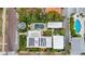 Property features a pool, solar panels, and lush landscaping at 220 14Th N Ave, St Petersburg, FL 33701