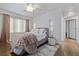 Spacious bedroom with plush bedding and large window at 220 14Th N Ave, St Petersburg, FL 33701