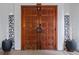 Ornate double doors with decorative carvings at 220 14Th N Ave, St Petersburg, FL 33701