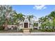 Charming Spanish-style home with lush landscaping and a double door entry at 220 14Th N Ave, St Petersburg, FL 33701