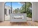 Modern linear fireplace offering a view of the pool area at 220 14Th N Ave, St Petersburg, FL 33701