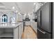 Modern kitchen with white cabinets and stainless steel appliances at 220 14Th N Ave, St Petersburg, FL 33701