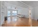 Bright living room with hardwood floors, built-in shelves, and a comfy sofa at 220 14Th N Ave, St Petersburg, FL 33701