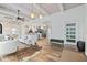 Open living room with high ceilings, hardwood floors, and fireplace at 220 14Th N Ave, St Petersburg, FL 33701