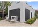 Outdoor patio with seating area and fireplace, adjacent to the house at 220 14Th N Ave, St Petersburg, FL 33701