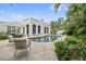 Relaxing kidney shaped pool with surrounding patio at 220 14Th N Ave, St Petersburg, FL 33701
