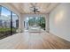 Sunroom featuring a fireplace and access to the backyard at 220 14Th N Ave, St Petersburg, FL 33701