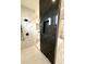 Contemporary bathroom with a black marble accent wall at 225 Tournament Rd, Rotonda West, FL 33947