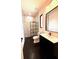 Modern bathroom with marble shower and dark hexagon tile at 225 Tournament Rd, Rotonda West, FL 33947