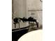Close up of modern black matte bathroom faucet and fixtures at 225 Tournament Rd, Rotonda West, FL 33947