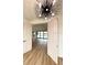 Open entryway with view to living area and pool at 225 Tournament Rd, Rotonda West, FL 33947