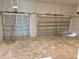 Large two car garage with high ceilings at 225 Tournament Rd, Rotonda West, FL 33947
