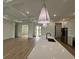 Open concept kitchen with island and breakfast bar at 225 Tournament Rd, Rotonda West, FL 33947