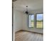 Bright office space with hardwood floors and large windows at 225 Tournament Rd, Rotonda West, FL 33947