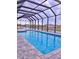 Beautiful screened pool and patio area at 225 Tournament Rd, Rotonda West, FL 33947