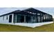 Home with large pool and screened enclosure at 225 Tournament Rd, Rotonda West, FL 33947